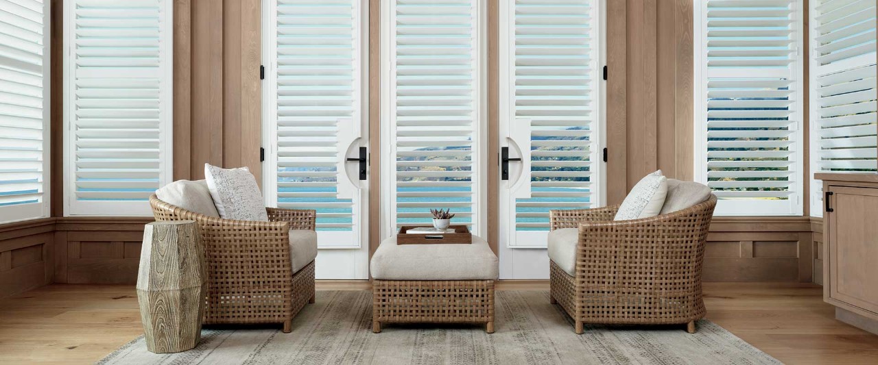 French door living room over looking ocean bay.